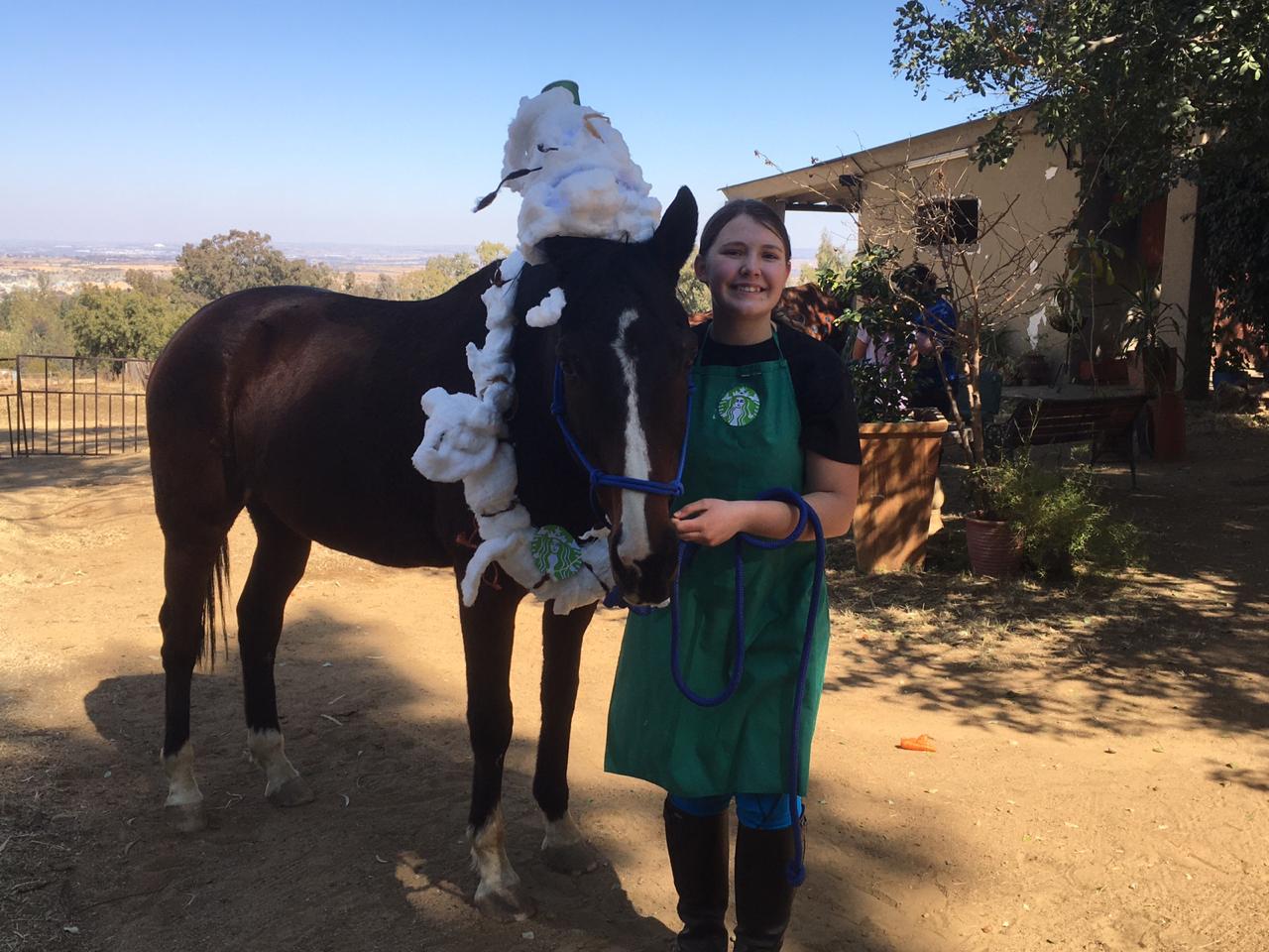Elaine Thomas and her horse Frappuccino - dressed as a frappuccino ;) and her as a StarBucks barista! ☕